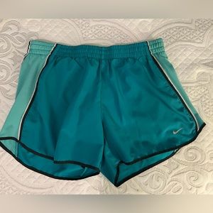 Size Medium Nike running shorts. Great condition!